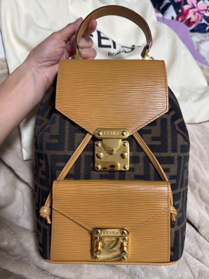 Fendi Backpack (Category: Luxury Bags & Wallets) located in Makati City. Submitted by everything.peachy (Listing ID 1390580504, Image 1). Description: Authentic Fendi Zucca Pattern Epi Leather Canvas Backpack - Bought in Japan - with dustbag - with Entrupy .