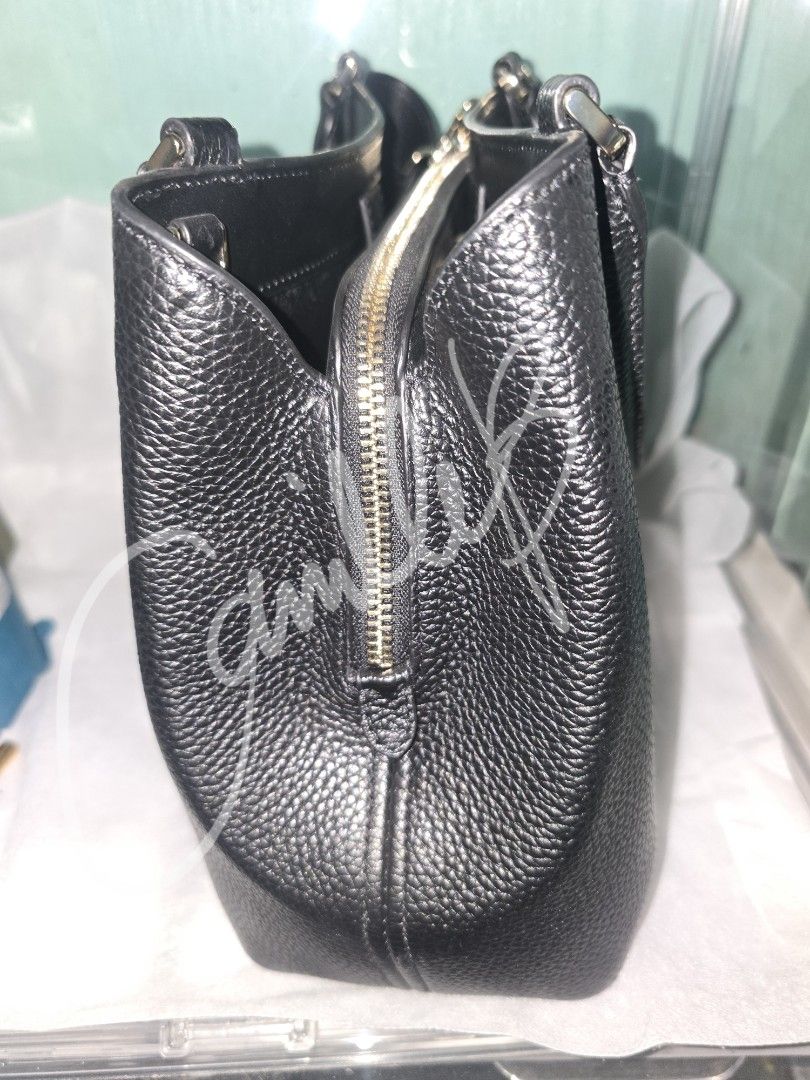 [BRANDED] KATE SPADE LENA SATCHEL (2ND HAND) (Category: Luxury Bags & Wallets) located in Quezon City. Submitted by algeaania (Listing ID 1391306380, Image 2). Description: Bought from Japan Og price: ¥90K Inclusion: Sling strap Dustbag Paperbag Measurements: Length: 11.8" Height: 9.08" Width: 4.4" Materials: Pebbled Leather Two way script logo lining Handle Handle drop: 5.25" Strap Strap Drop: 22" Features Back zip pocket Snap closure Middle zip