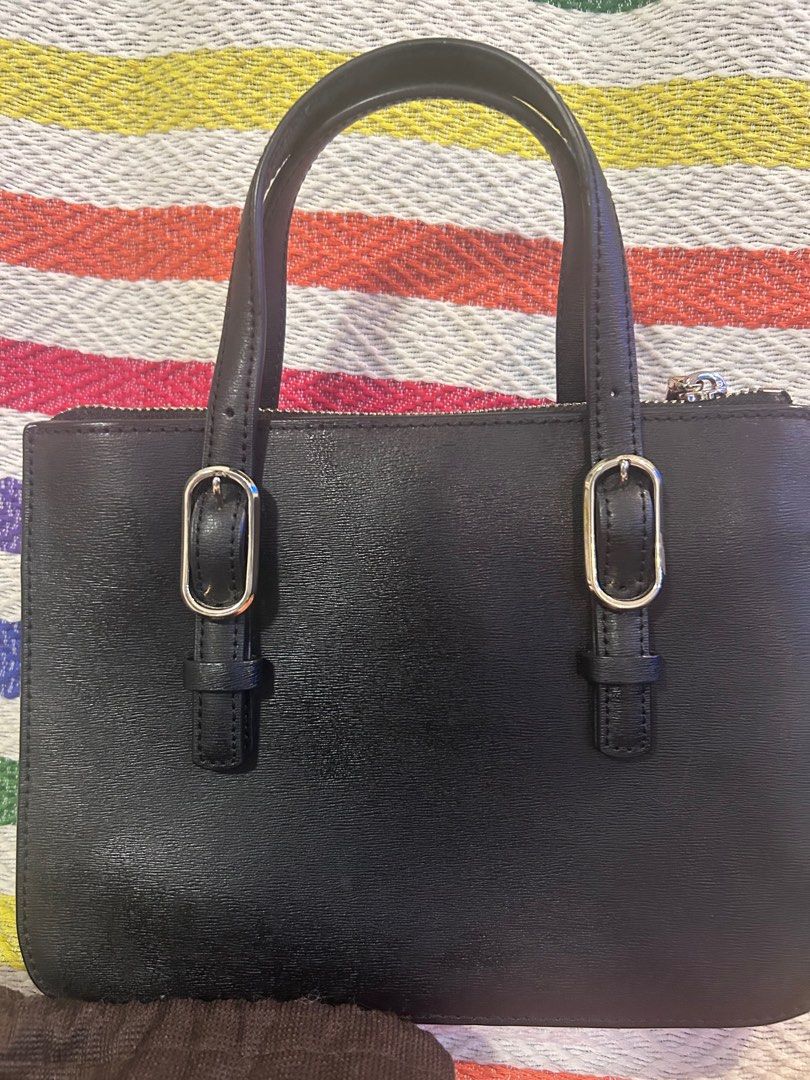 Kate Spade Mini Connie Satchel Bag (Category: Luxury Bags & Wallets) located in Pasig City. Submitted by declutteringiza (Listing ID 1391168212, Image 3). Description: Authentic Kate Spade bag Complete inclusion (as seen in photos) Can fit iphone pro max RFS: too small for me.