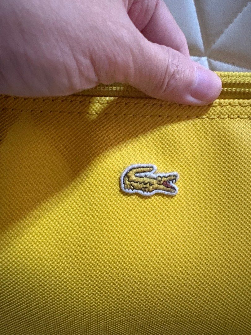 Authentic Lacost PVC shoppers bag small (Category: Luxury Bags & Wallets) located in Cavite. Submitted by cbmae (Listing ID 1391184201, Image 2). Description: lightly used.