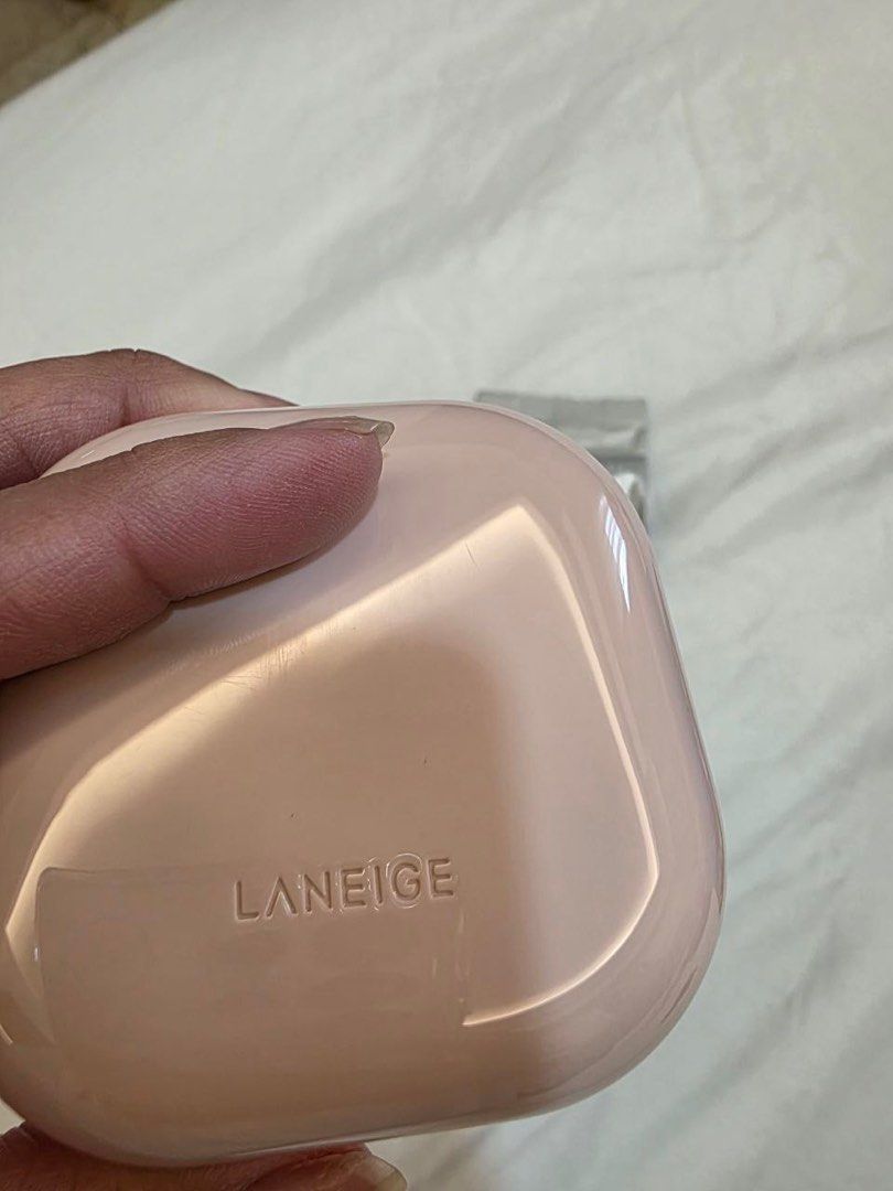 Laneige Cushion Foundation 25N (Category: Makeup) located in Quezon City. Submitted by hollyarevalo (Listing ID 1391161269, Image 2). Description: Laneige Cushion Foundation shade 25N. Refillable. Used the initial one included in the container. Refil is new and unused. Expiring January 2026. Sponge is used but washed and sanitized already.Bought in Bangkok 2025.