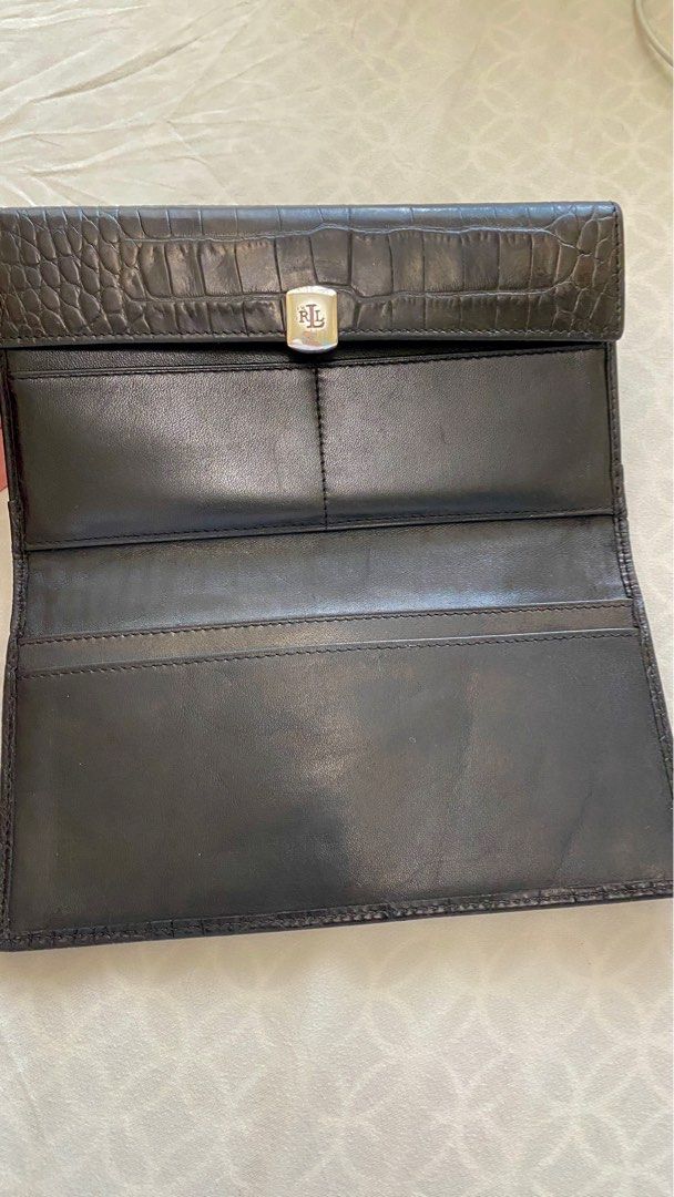 Lauren by Ralph Lauren Long Wallet (Category: Wallets & Card holders) located in Mandaluyong City. Submitted by NAO006 (Listing ID 1391199644, Image 2). Description: This is an authentic Lauren wallet. Ony signs of usage but quite nice, clean and presentable. I'm decluttering some of my big bags and wallets. I prefer smaller ones now. All sales are final. Please scrutinize the pictures before making a purchase. Please note that these are pre-love