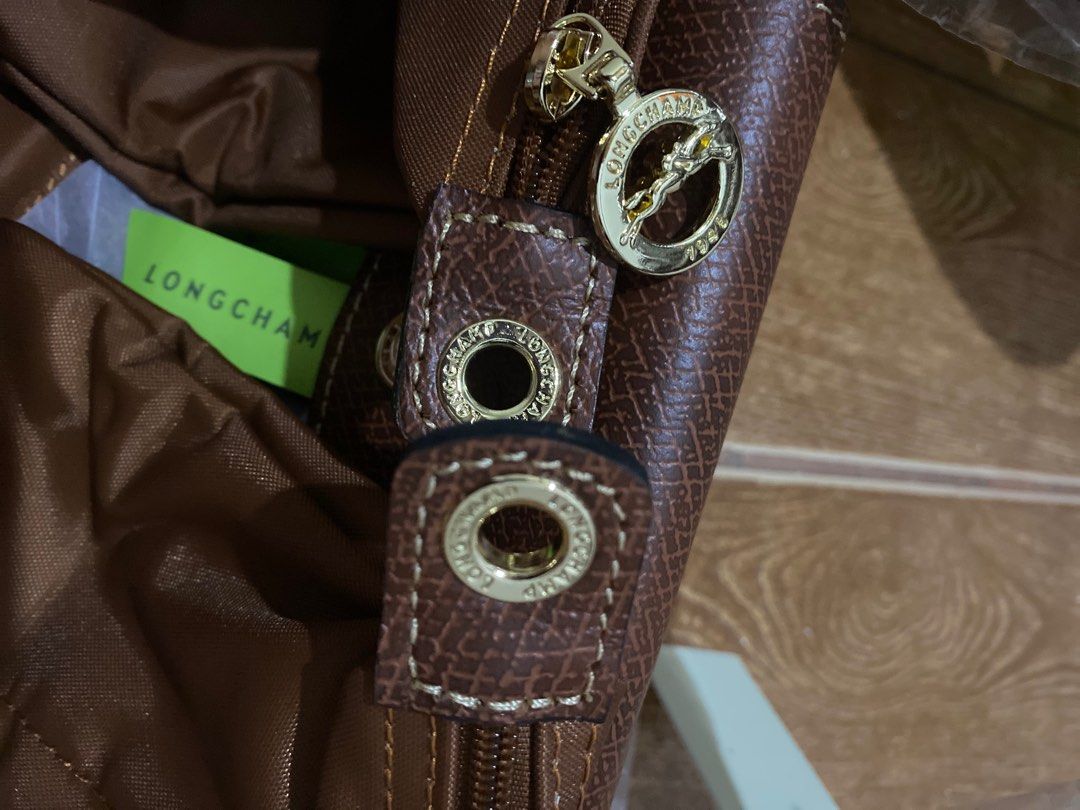 Longchamp le pliage-small with strap(cognac) (Category: Luxury Bags & Wallets) located in General Tinio. Submitted by andy_1129 (Listing ID 1391277441, Image 3). Description: Once nagamit .