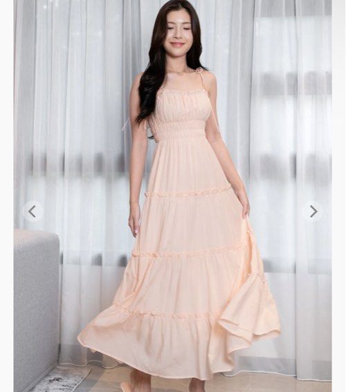 LORETTA TENCEL RUFFLES TIE-STRING RUCHED TIERED MAXI DRESS (PALE PEACH) (Category: Dresses) located in Singapore. Submitted by peachyvibesco (Listing ID 1391341963, Image 1). Description: RTP $58.90 selling at $40 Doesn’t suit me.