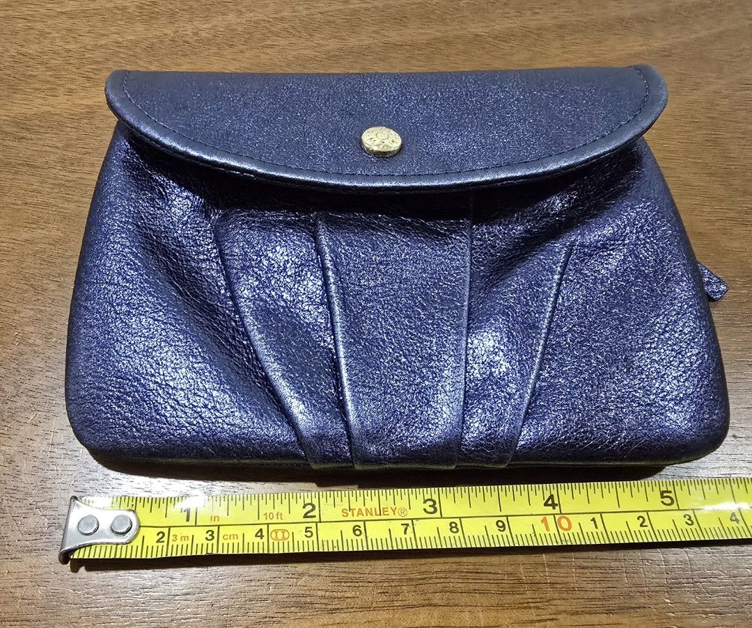 MZ WALLACE New York wallet (Category: Wallets & Card holders) located in Manila. Submitted by misstoomanythings (Listing ID 1391213545, Image 3). Description: Navy blue leather wallet from MZ Wallace New York Inside and outside zipped compartment With 2 additional sections for your cash & receipts Wallet is in great condition with signs of natural patina.
