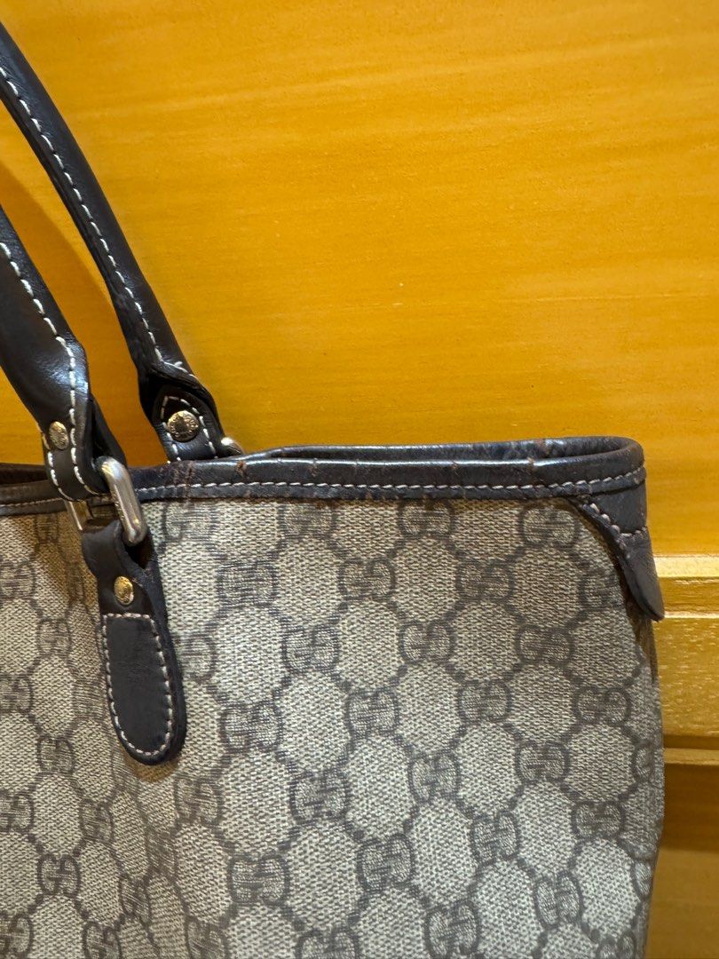 Original Gucci Tote Bag (Category: Luxury Bags & Wallets) located in Taguig. Submitted by isiah4110 (Listing ID 1391298330, Image 3). Description: Pre-loved Original Gucci Bag Bought from Hongkong since 2011 Manage your expectations as this was heavily used. Refurbished and changed the handles. Stains inside but unnoticeable when in use Cracks on the leather trims Still beautiful and has that charm of a Gucci shoulder bag.