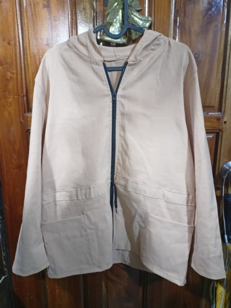Parka jacket (Nude/Khaki/Beige color) (Category: Coats, Jackets and Outerwear) located in Manila. Submitted by bookedbyjam (Listing ID 1391343380, Image 2). Description: Parka Jacket bought from Taytay clothing shop. Never been used. Original price at the screenshot. RFS: Too big for me and not my preferred color. Never got a chance to refund..