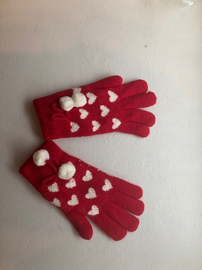 Red Heart Pattern Gloves (Category: Gloves) located in Singapore. Submitted by mandou (Listing ID 1391199713, Image 2). Description: - Red gloves - Heart pattern - Pom-pom details - Excellent condition - Perfect for winter.
