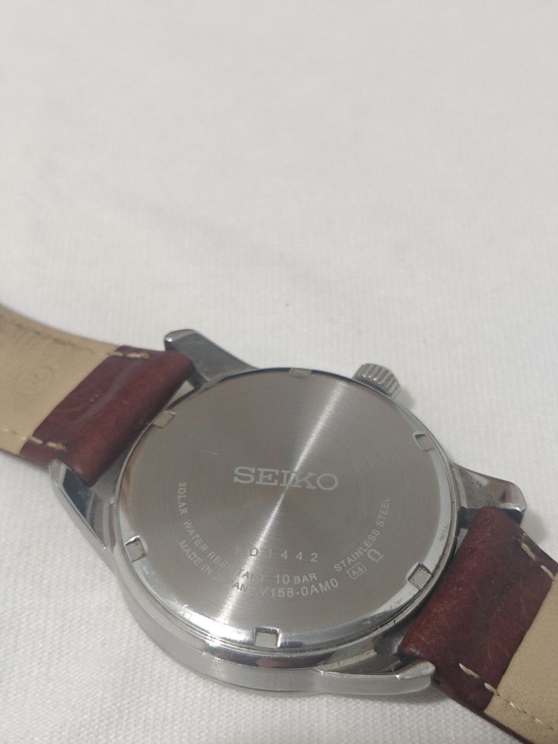 Seiko Solar V158-0AM0 (Category: Men's Watches) located in Quezon City. Submitted by brixl (Listing ID 1391265319, Image 3). Description: Seiko Solar V158-0AM0 This is a solar watch. It doesn’t need direct sunlight—just avoid keeping it in a dark place, and it will keep working." Box po wala na, nabaha kasi dahil nakatago. pero may replacement box. see pic. Belt napalitan na from black to brown. Nasaken pa orig belt pero sira na kasi. issue: Mino