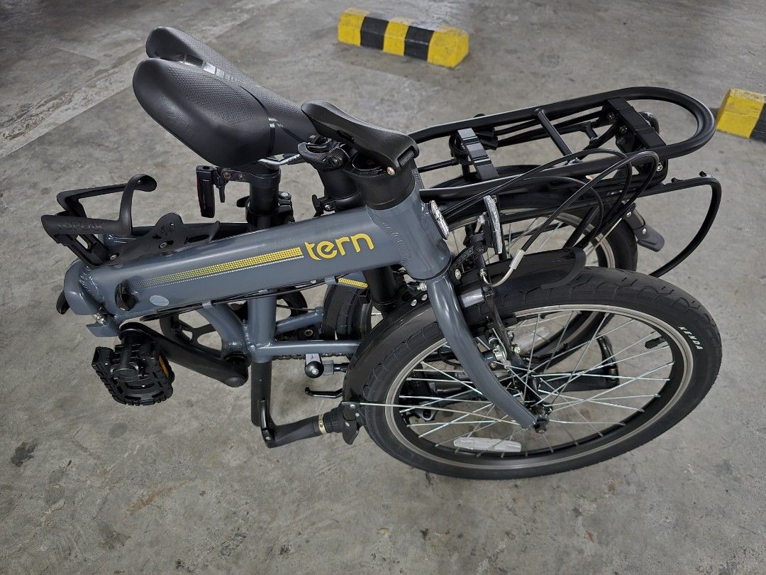 Tern Link A7 + Accessories (Category: Bicycles) located in Mandaluyong City. Submitted by marchmeister (Listing ID 1391310931, Image 2). Description: Tern Link A7 Speeds: 1 x 7 Gear Inches: 36" - 72" (2.86 - 5.72 m) Folding Size: 39.5 × 80 × 73 cm (15.6 × 31.5 × 28.7 in) Distance: Saddle to Pedal: 70 - 96 cm (27.6 - 37.8 in) Suggested Rider Height: 142 - 190 cm (55.9 - 74.8 in) Max Gross Vehicle Weight: 120 kg (264.6 lb) Max Rider Weight: 105 kg 