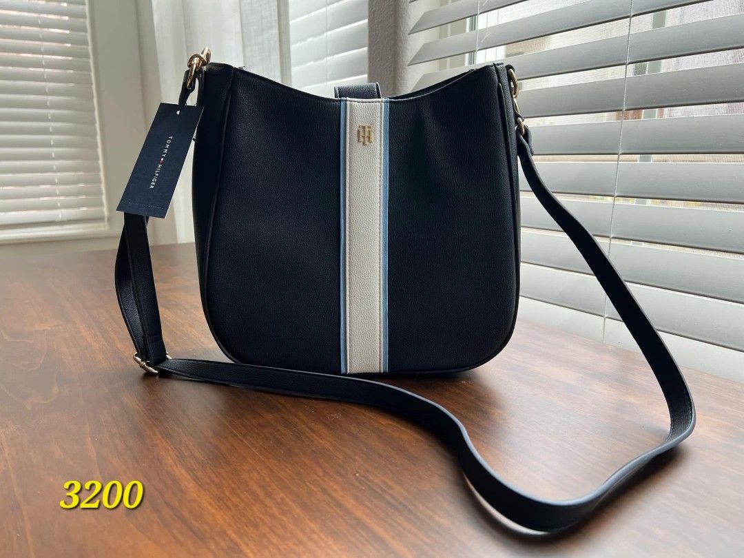 TH Crossbody Bag (Category: Luxury Bags & Wallets) located in Marikina City. Submitted by declutter_closet_ph (Listing ID 1391320183, Image 1). Description: US bought.