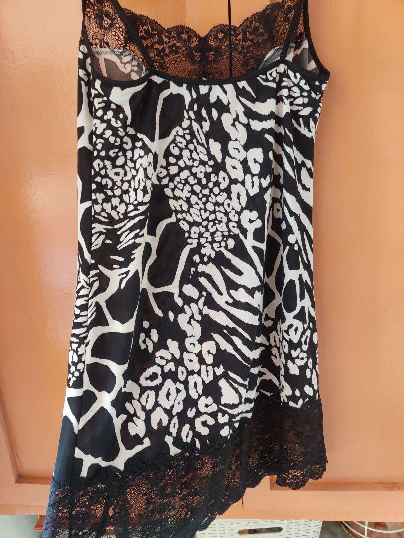Animal print dress/top (Category: Sleeveless) located in Apalit. Submitted by daintynyla (Listing ID 1391399127, Image 2). Description: - Can be worn as a top or dress underneath your stockings. - light fabric - comfy to wear.