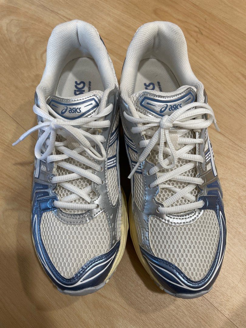 Asics Gel-Kayano 14 - White/Silver/Blue (Category: Sneakers) located in Singapore. Submitted by sgnumberoneeee (Listing ID 1391436023, Image 3). Description: - Used Asics Gel-Kayano 14 running shoes - Color: White, Silver, Blue - Condition: Good, with some wear on soles and uppers - Plenty of life remaining.