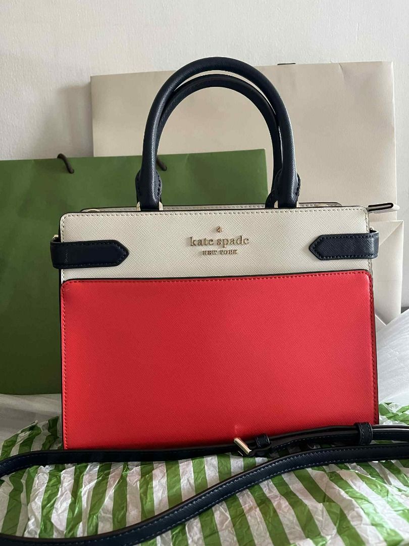 Authentic Kate Spade Saffiano Leather Satchel Bag (Category: Luxury Bags & Wallets) located in Rizal. Submitted by jobeee_ph (Listing ID 1391417420, Image 1). Description: Authentic or your money back. Brand New Condition 9.5/10 Only used twice or three times max, so im letting go since I don't reach for this often. Kate Spade Satchel Bag MEDIUM Style: Staci Colorblock Retails for P10k Crafted from durable Saffiano leather, this structured satche