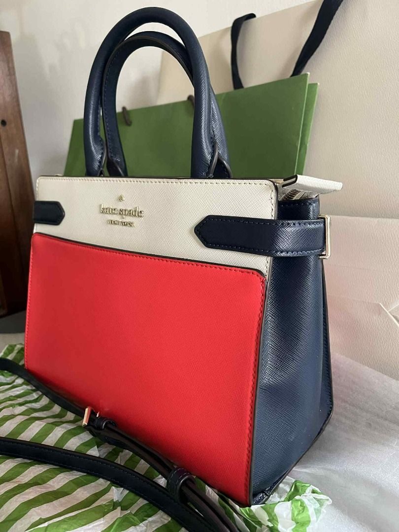 Authentic Kate Spade Saffiano Leather Satchel Bag (Category: Luxury Bags & Wallets) located in Rizal. Submitted by jobeee_ph (Listing ID 1391417420, Image 3). Description: Authentic or your money back. Brand New Condition 9.5/10 Only used twice or three times max, so im letting go since I don't reach for this often. Kate Spade Satchel Bag MEDIUM Style: Staci Colorblock Retails for P10k Crafted from durable Saffiano leather, this structured satche