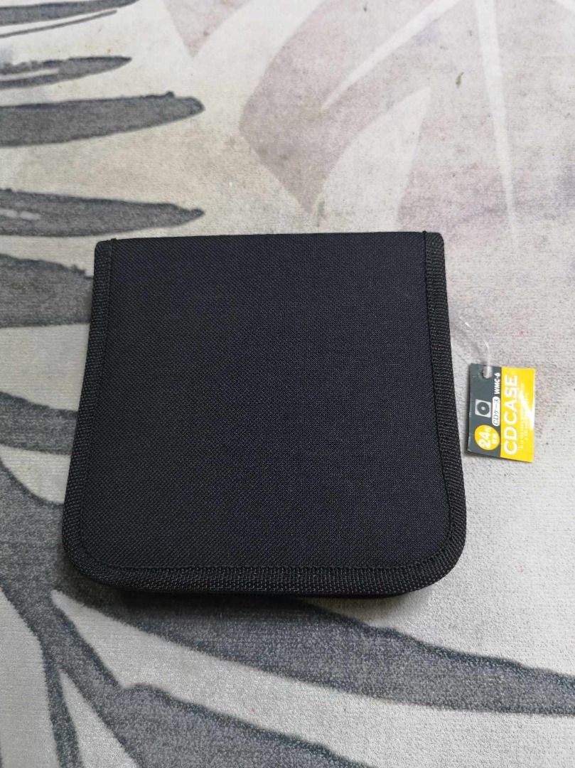 Black Zipper Closure CD Storage (Category: Portable Audio Accessories) located in Santa Cruz. Submitted by jmy_surplus.2 (Listing ID 1391425005, Image 1). Description: Size ; L - 6 W - 6 Color ; Black Type ; CD Storage Brand ; No brand Material ; Nylon Style ; Black CD Storage LG 119 JMY 5 Batch #147.