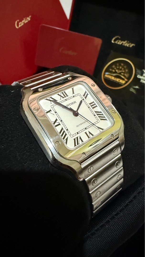 Cartier Santos Medium (Category: Luxury Watches) located in Manila. Submitted by troy_anthonyy (Listing ID 1391409975, Image 2). Description: Cartier Santos de Cartier Medium – WSSA0010 (Steel) ✨ Details: • Model: Santos de Cartier Medium (Steel) • Reference: WSSA0010 • Case Size: 35.1mm (Medium) • Material: Stainless Steel • Dial: Silvered opaline with Roman numerals • Movement: Automatic • Condition: Excellent, lightly used • Inclusions: Origin