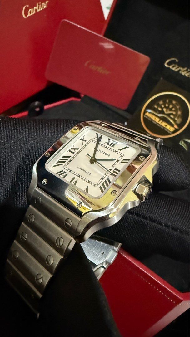 Cartier Santos Medium (Category: Luxury Watches) located in Manila. Submitted by troy_anthonyy (Listing ID 1391409975, Image 3). Description: Cartier Santos de Cartier Medium – WSSA0010 (Steel) ✨ Details: • Model: Santos de Cartier Medium (Steel) • Reference: WSSA0010 • Case Size: 35.1mm (Medium) • Material: Stainless Steel • Dial: Silvered opaline with Roman numerals • Movement: Automatic • Condition: Excellent, lightly used • Inclusions: Origin