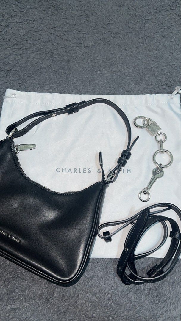CHARLES & KEITH Hand bag (Original) (Category: Shoulder Bags) located in Davao. Submitted by aklaire06 (Listing ID 1391505818, Image 1). Description: CHARLES & KEITH hand bag (original) bought it in their physical store in SM MOA . Originally bought it for ₱4,000. In the color black. Comes with dust bag, extender, and strap..
