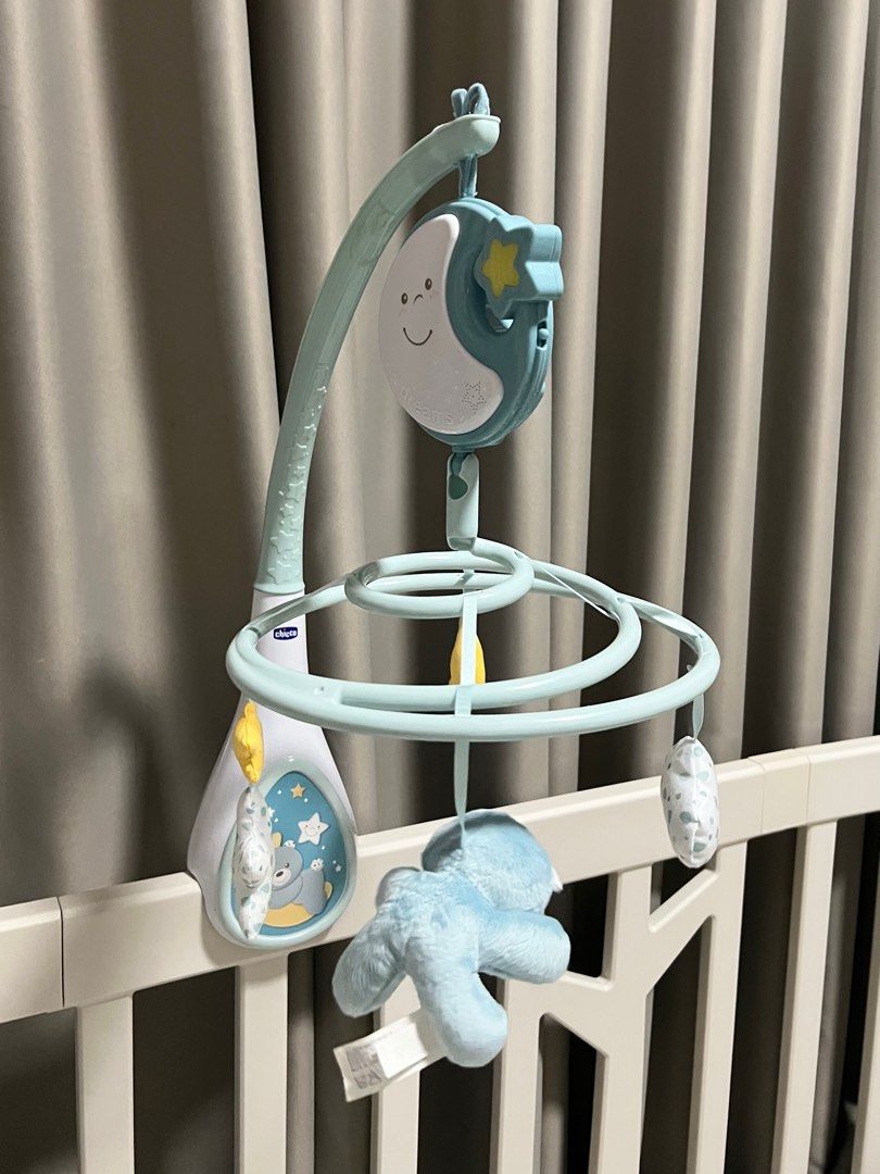 Chicco Next 2 Dream Crib Hanging Toys (Category: Cots & Cribs) located in Rizal. Submitted by hazelco (Listing ID 1391532999, Image 1). Description: Chicco Next 2 Dreams Lightly used ✨ The first cot mobile that is close to to baby’s dreams. - Fits onto the Next2Me cradle, and most wooden beds. - 20 minutes of classical music and white noise (designed to echo the heartbeats and calming sounds heard by baby in mummy’s tummy). - Soft night light. - 
