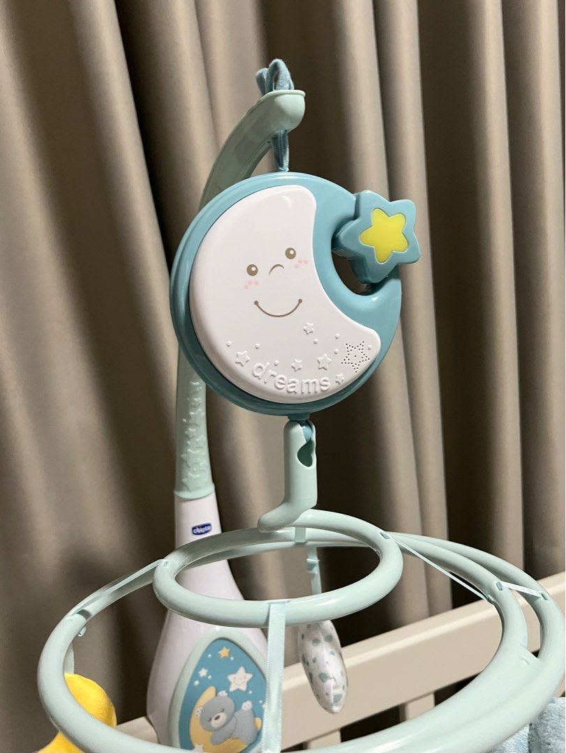 Chicco Next 2 Dream Crib Hanging Toys (Category: Cots & Cribs) located in Rizal. Submitted by hazelco (Listing ID 1391532999, Image 2). Description: Chicco Next 2 Dreams Lightly used ✨ The first cot mobile that is close to to baby’s dreams. - Fits onto the Next2Me cradle, and most wooden beds. - 20 minutes of classical music and white noise (designed to echo the heartbeats and calming sounds heard by baby in mummy’s tummy). - Soft night light. - 