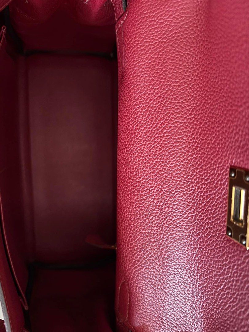 Kelly 28 Rouge Grenat (Category: Luxury Bags & Wallets) located in Taguig. Submitted by timelesstotesph (Listing ID 1391424226, Image 2). Description: Kelly 28 Rouge Grenat Ghw Stamp X With box, dustbag, care booklet, strap Meetups available .