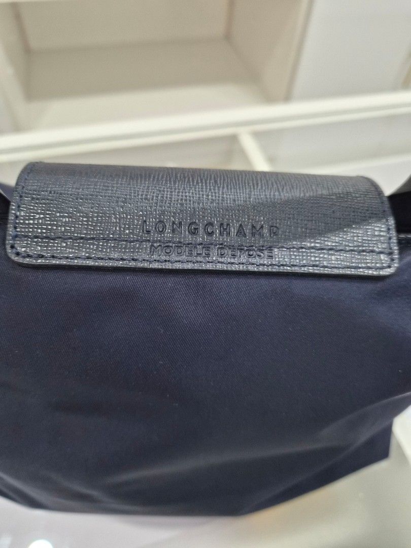 Longchamp Neo (Category: Luxury Bags & Wallets) located in Mandaluyong City. Submitted by seafoamint (Listing ID 1391478271, Image 3). Description: authentic with crossbody strap size medium color navy.