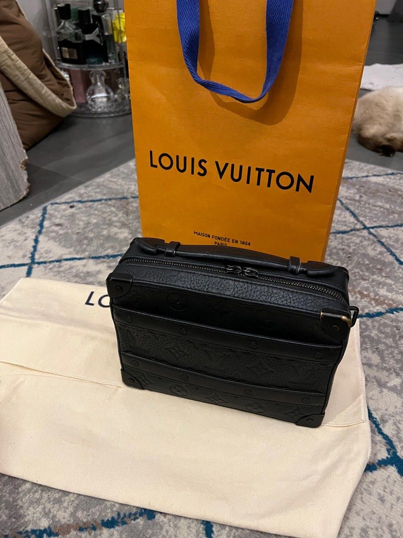 Louis Vuitton Mini Trunk Crossbody Bag (Category: Luxury Bags & Wallets) located in Bacoor. Submitted by facio3 (Listing ID 1391525658, Image 2). Description: For sale or trade! Super sale! LV mini trunk crossbody bag With paper bag and sustbag 66k only! Used! Please check photos.