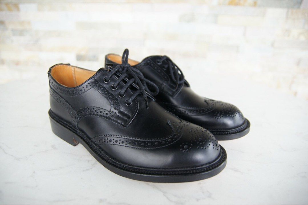 Marks & Spencer Black Leather Brogues (UK 9-11) (Category: Casual Shoes) located in Tangalan. Submitted by shopnook (Listing ID 1390446775, Image 1). Description: ✅ Authentic Marks & Spencer ✅ Classic black leather brogue shoes ✅ With wingtip & perforated detailing ✅ Size: UK 9–11 (Made in India) ✅ Model code: T03/2142/2904 | UPC: 6510596 ✅ Elegant & versatile – perfect for formal or smart casual wear ✅ Pre-loved, in good condition 💼 Comfortable