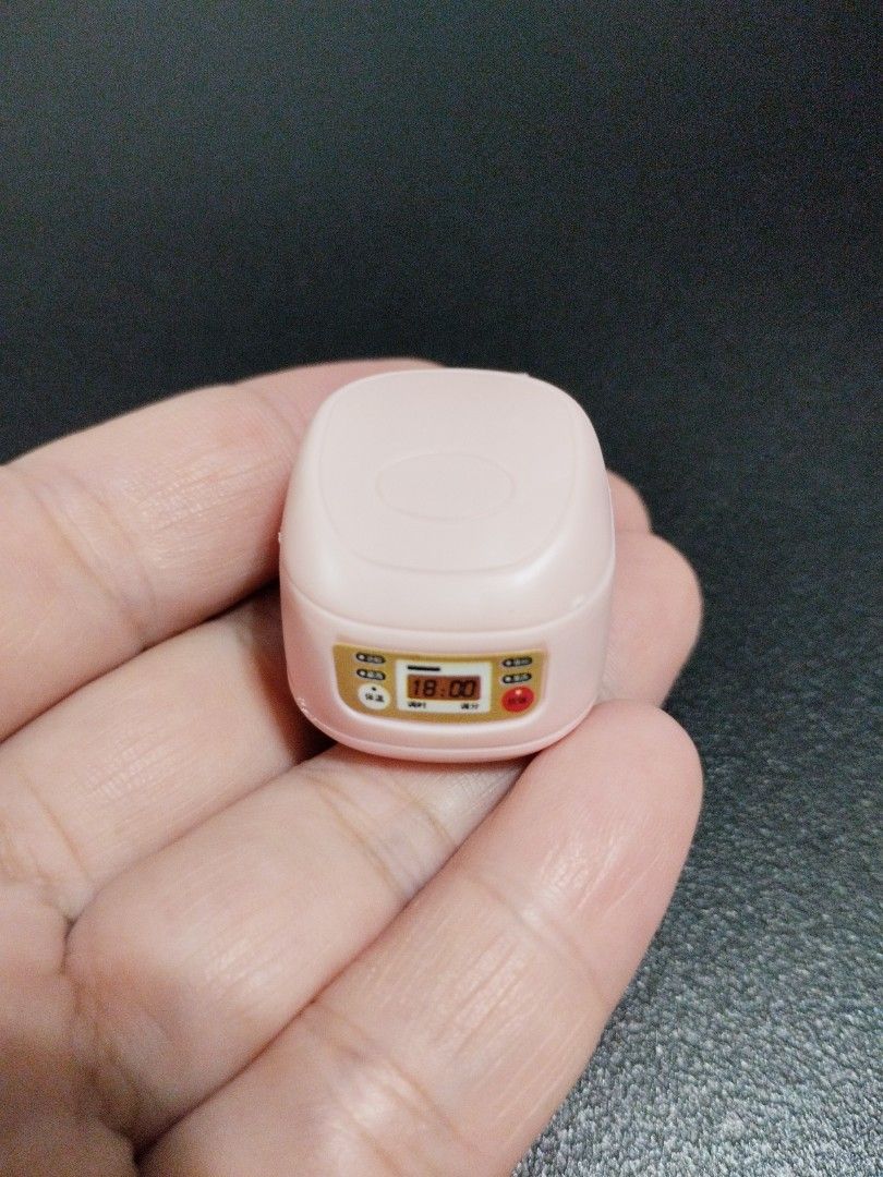 Miniature rice cooker (pink) (Category: Cookers) located in Manila. Submitted by krystalchewey_ (Listing ID 1391463319, Image 1). Description: Bnew Actual Photo posted Mini rice cooker 125php pink.