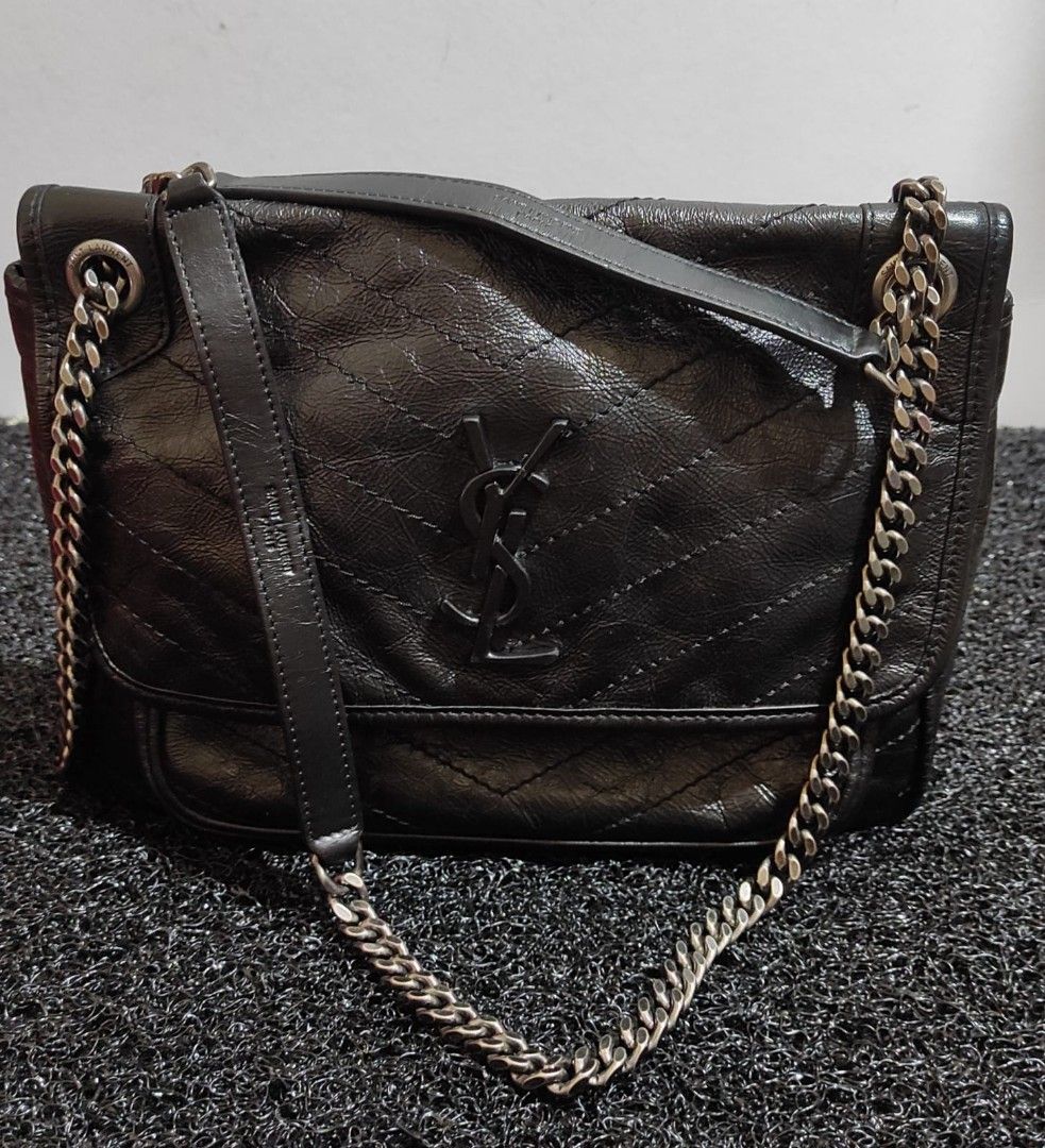 Orig Ysl niki medium chain bag (Category: Luxury Bags & Wallets) located in Pasay City. Submitted by highkeys (Listing ID 1391532818, Image 1). Description: Rank A What you see is what you get Can send additional photos upon request No inclusions Pasay city location Meet up anywhere around metro manila.