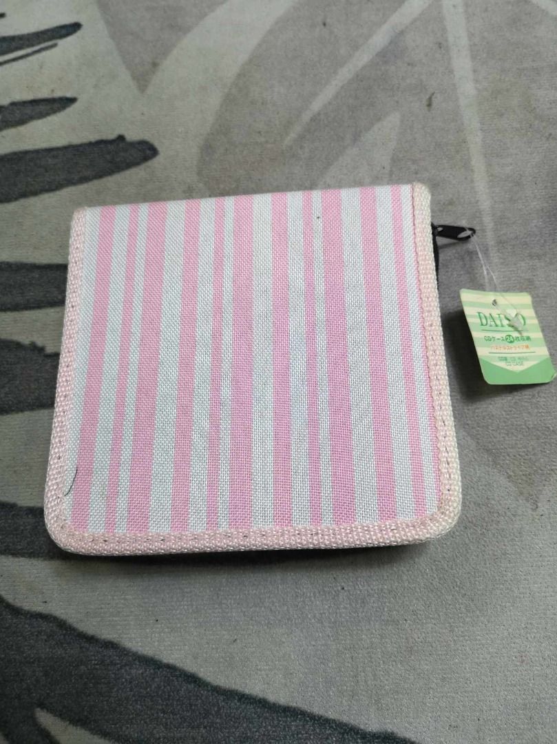 Pink Stripe Zip Around CD Storage (Category: Portable Audio Accessories) located in Santa Cruz. Submitted by jmy_surplus.2 (Listing ID 1391424784, Image 3). Description: Size ; L - 6 W - 6.2 Color ; Pink Type ; CD Storage Brand ; No Brand Material ; Nylon Style ; Pink CD Storage LG 119 JMY 5 Batch #147.