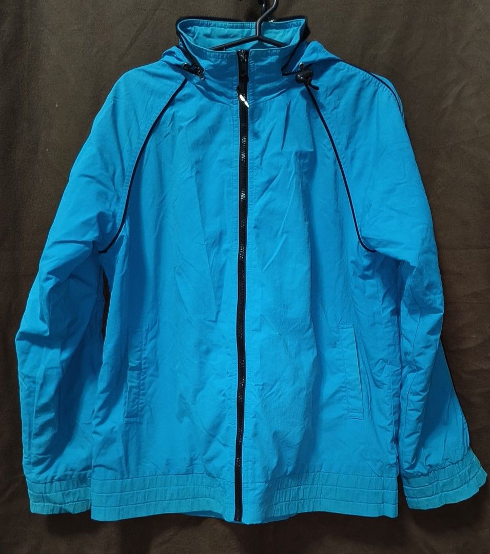 Pre-owned Windbreaker Jacket with Hoodie (Category: Coats, Jackets and Outerwear) located in Antipolo. Submitted by milanbenjohn (Listing ID 1391466602, Image 1). Description: Pre-owned Windbreaker Jacket with Hoodie 👉Material: Polyester 👉With 2 sides pocket 👉In good used condition 👉Size: fit to M-L Exact Dimensions 👇 Length: 25 inches Width: 21 inches Sleeves length: 24 inches.