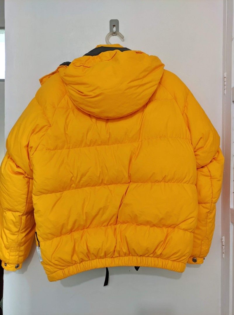 Waterproof Raincoat / Puffer Jacket / Down Jacket / Yellow, Size XS - S (Category: Coats, Jackets and Outerwear) located in Quezon City. Submitted by samotsare (Listing ID 1391474026, Image 2). Description: Puffer / Down Jacket Unisex Mustard yellow , no fading Worn only for this photo listing Size XS - S 20 inches (armpit to armpit) 25 inches (length) Wearer (last photo) is 5 feet tall, slim-bodied Pede rin sa slim guys Pertex fabric YKK zippers