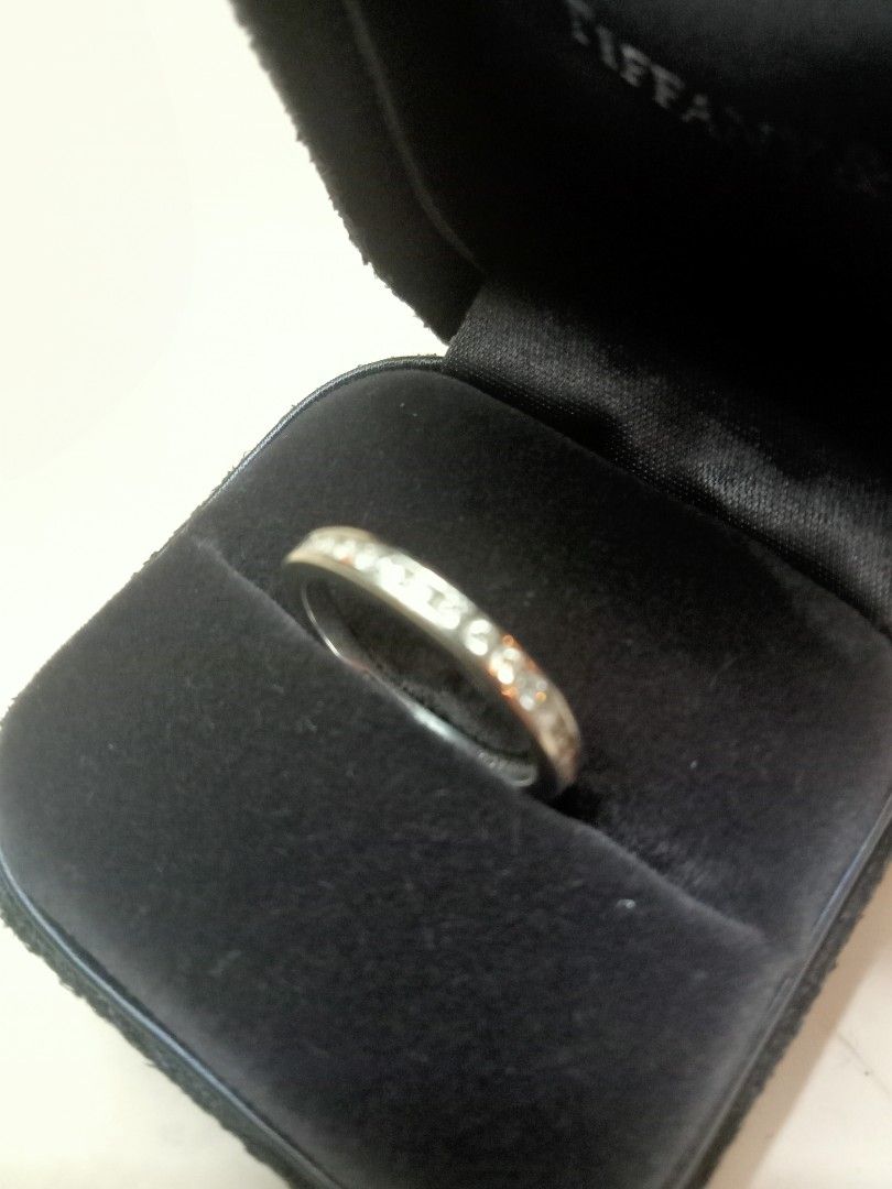Tiffany ring (Category: Rings) located in Paranaque City. Submitted by jakes.bodega (Listing ID 1391459280, Image 1). Description: RUSH SALE forever band ring in platinum with diamonds in half ring 2.2mm needs cleaning, well kept in safe and stored only. Tiffany & co. authentic however, no receipts and no certificate anymore, lost it. we can go to Tiffany or any known jewelry store that can tell us it's authentic for safety. NEGOTIABLE.