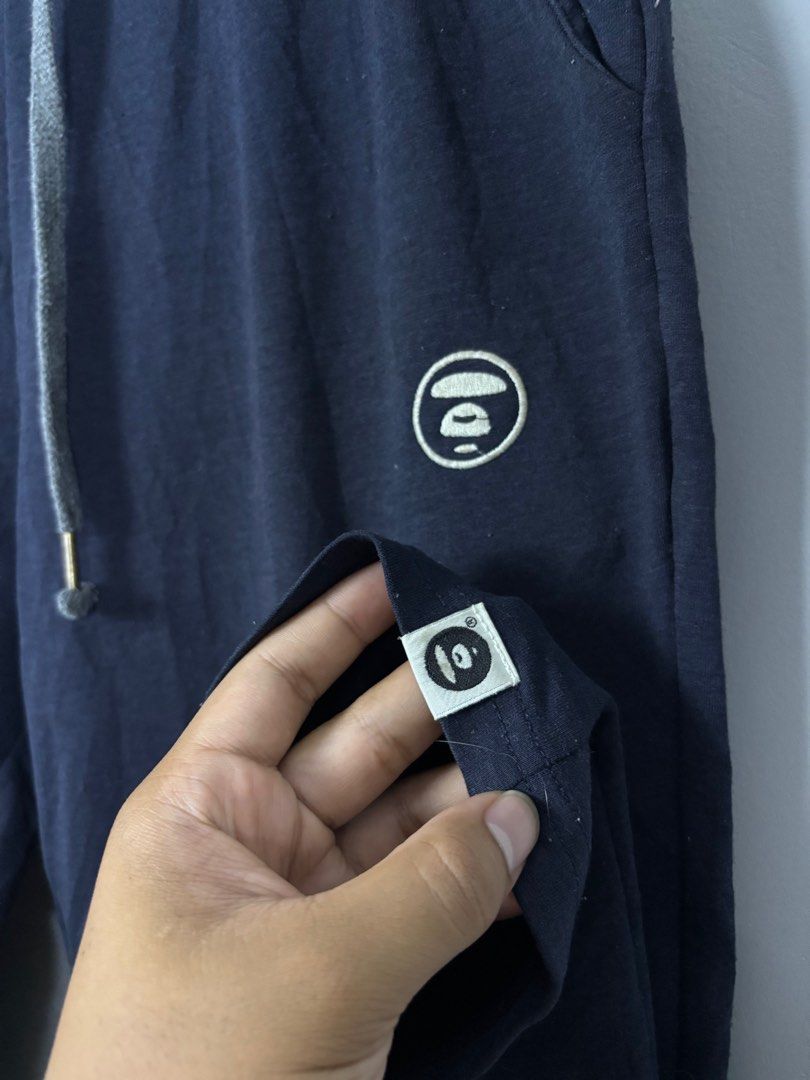 AAPE BY BATHING APE JOGGER PANTS (Category: Joggers) located in Mabalacat. Submitted by doughnutthrift (Listing ID 1391683153, Image 3). Description: Excellent condition Color Rate – 9.5/10 W- 32-36” L- 38” Issue: None .