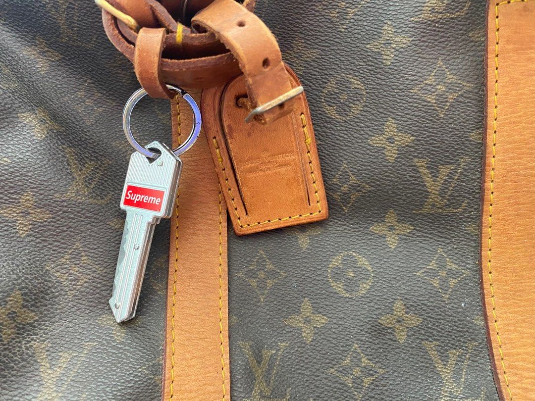 LOUIS VUITTON KEEPALL 45 with padlock/2keys- ANTIQUE (Category: Luxury Bags & Wallets) located in Makati City. Submitted by celebrityauctions (Listing ID 1391563792, Image 3). Description: “INCLUSIVE OF THE NEW KEY CHAIN”The image displays a vintage Louis Vuitton Keepall 45 bag. The Louis Vuitton Keepall 45 is a classic and popular travel bag known for its spacious interior and durable design. The “45” in its name refers to its length in centimet