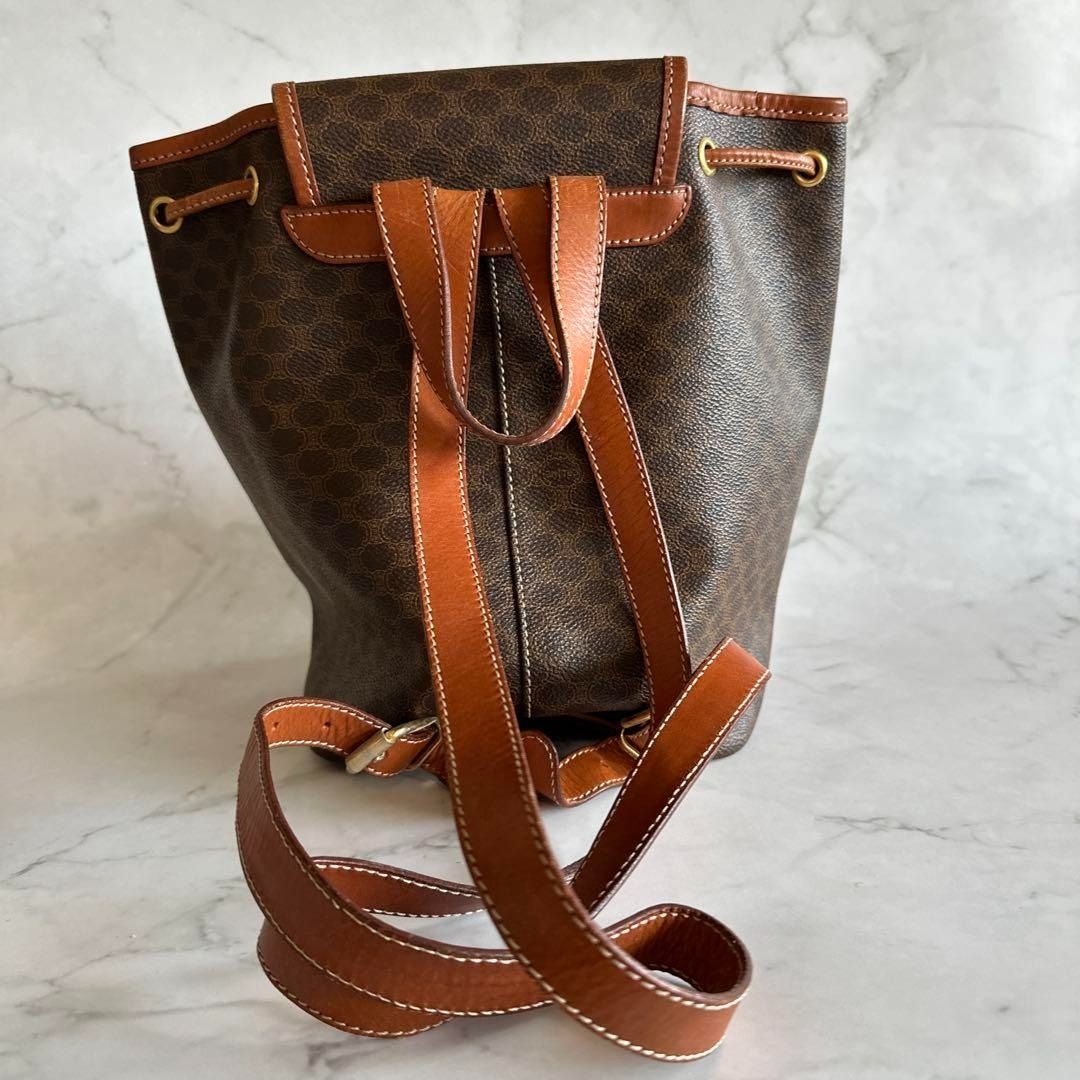 Authentic CELINE Macadam Mini Backpack w/ Certificate of Appraisal (Category: Luxury Bags & Wallets) located in General Trias. Submitted by japan_secondhand_products (Listing ID 1391648960, Image 2). Description: brand CELINE - Color: Brown - Design: Backpack with flap - Number of pockets: 1 outer pocket - Strap: Adjustable shoulder strap Thank you for looking. Please check the photos to see the item. I think it's a beautiful vintage item. The si