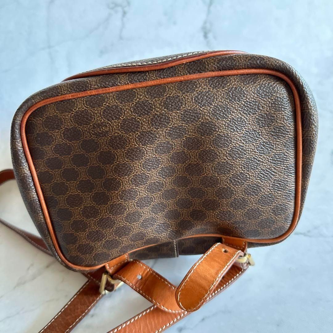 Authentic CELINE Macadam Mini Backpack w/ Certificate of Appraisal (Category: Luxury Bags & Wallets) located in General Trias. Submitted by japan_secondhand_products (Listing ID 1391648960, Image 3). Description: brand CELINE - Color: Brown - Design: Backpack with flap - Number of pockets: 1 outer pocket - Strap: Adjustable shoulder strap Thank you for looking. Please check the photos to see the item. I think it's a beautiful vintage item. The si
