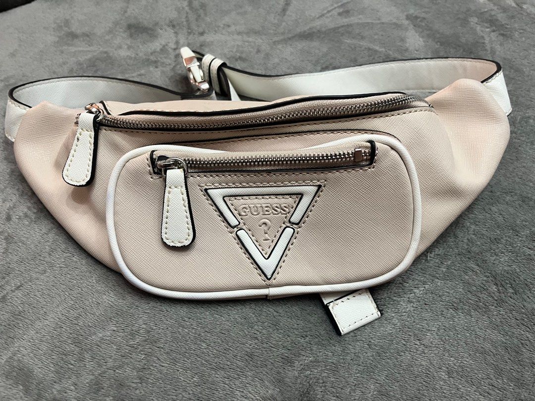 Authentic Guess beltbag (light pink) (Category: Luxury Bags & Wallets) located in Quezon City. Submitted by myfabpreloved (Listing ID 1391564889, Image 1). Description: Authentic Bought in US With minimal flaw — discoloration (bluish) as seen s photo pakicheck nlng po maigi. No other issue aside from that .