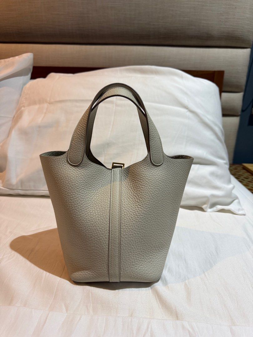 Authentic Hermes Picotin 18 (Category: Luxury Bags & Wallets) located in Bulacan. Submitted by glvzicbg_ (Listing ID 1391599348, Image 2). Description: Authentic Hermes Picotin 18 No flaws - Like new With free generic strap Inclusions: Complete set Rfs: Declutter.