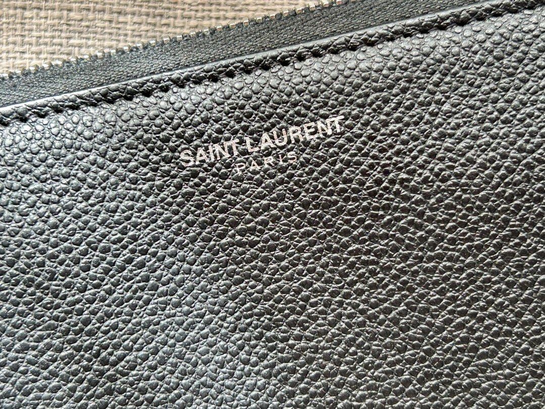 AUTHENTIC YSL Zippy Wallet (Category: Luxury Bags & Wallets) located in Paranaque City. Submitted by Re_Up (Listing ID 1391559724, Image 3). Description: Super clean pa but there are minor flaws that is slightly noticeable but may be able to be fixed. Hardware are in very good condition, no foul smell. No other inclusions but can guarantee it’s authentic. Price is firm..