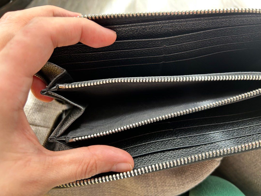 AUTHENTIC YSL Zippy Wallet (Category: Luxury Bags & Wallets) located in Paranaque City. Submitted by Re_Up (Listing ID 1391559724, Image 2). Description: Super clean pa but there are minor flaws that is slightly noticeable but may be able to be fixed. Hardware are in very good condition, no foul smell. No other inclusions but can guarantee it’s authentic. Price is firm..