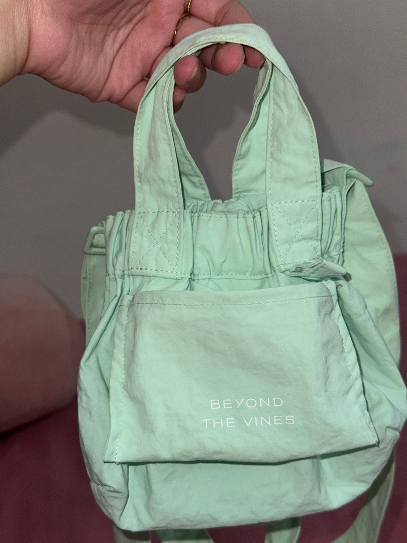 BEYOND THE VINES MICRO DUMPLING BAG (Category: Purses & Pouches) located in San Juan City. Submitted by declutterbykrispy (Listing ID 1391669092, Image 2). Description: ORIGINAL Beyond the vines micro dumpling bag in NEO MINT. No stain Btv logo still complete Metals still good no tarnish .