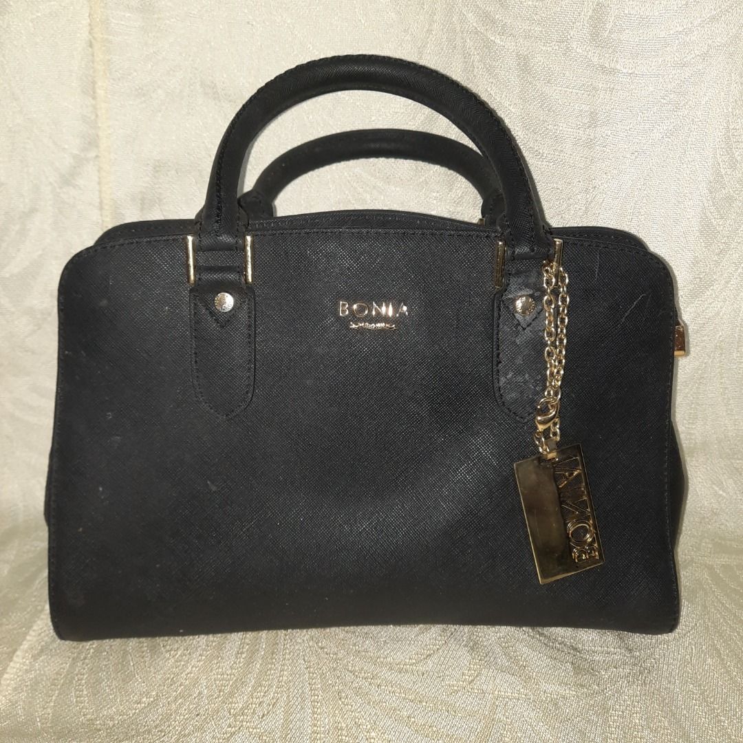 Bonia Heritage handbag (Category: Luxury Bags & Wallets) located in Pasay City. Submitted by hashi_ (Listing ID 1391646305, Image 1). Description: !! ALL MUST GO !! > Prices are negotiable, as long as shipping fee is shouldered by buyer > For more pics, details, flaws and etc, kindly dm me <3 can get for free if you buy another bag! Loc: Pasay City MOP: GCash.
