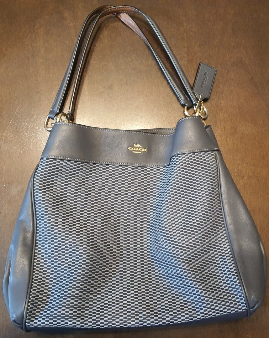 Coach Legacy Jacquard Lexy Blue (Category: Luxury Bags & Wallets) located in Malolos. Submitted by aonf1 (Listing ID 1391594507, Image 1). Description: authentic 3 compartments canvas and leather medium size.