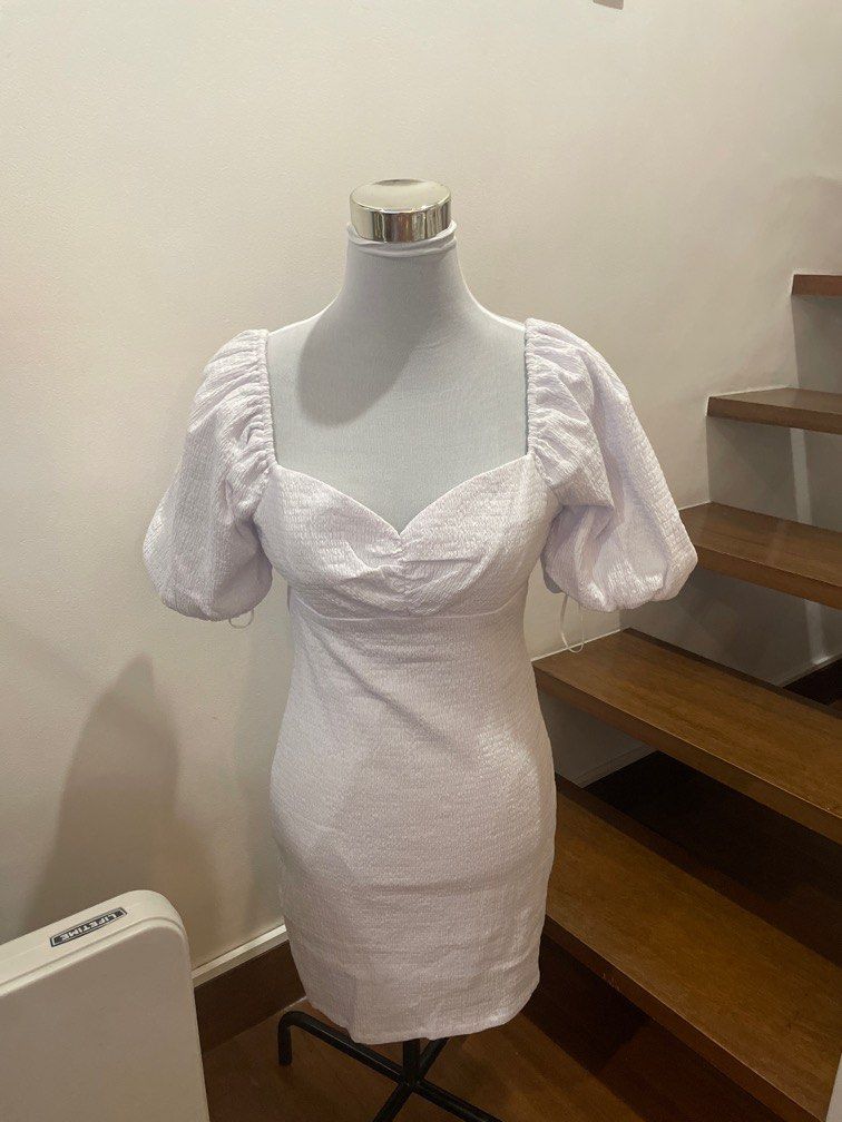 GUESS White ruffle sleeve mini dress (Category: Dresses) located in Quezon City. Submitted by starfleurs (Listing ID 1391645009, Image 1). Description: AUTHENTIC GUESS Bought from Outlet Size: S (runs large) -> M Never been used Fits 34-36" bust, 28-30" waist line MOP: GCash Shipping fee c/o buyer Location: Quezon City.