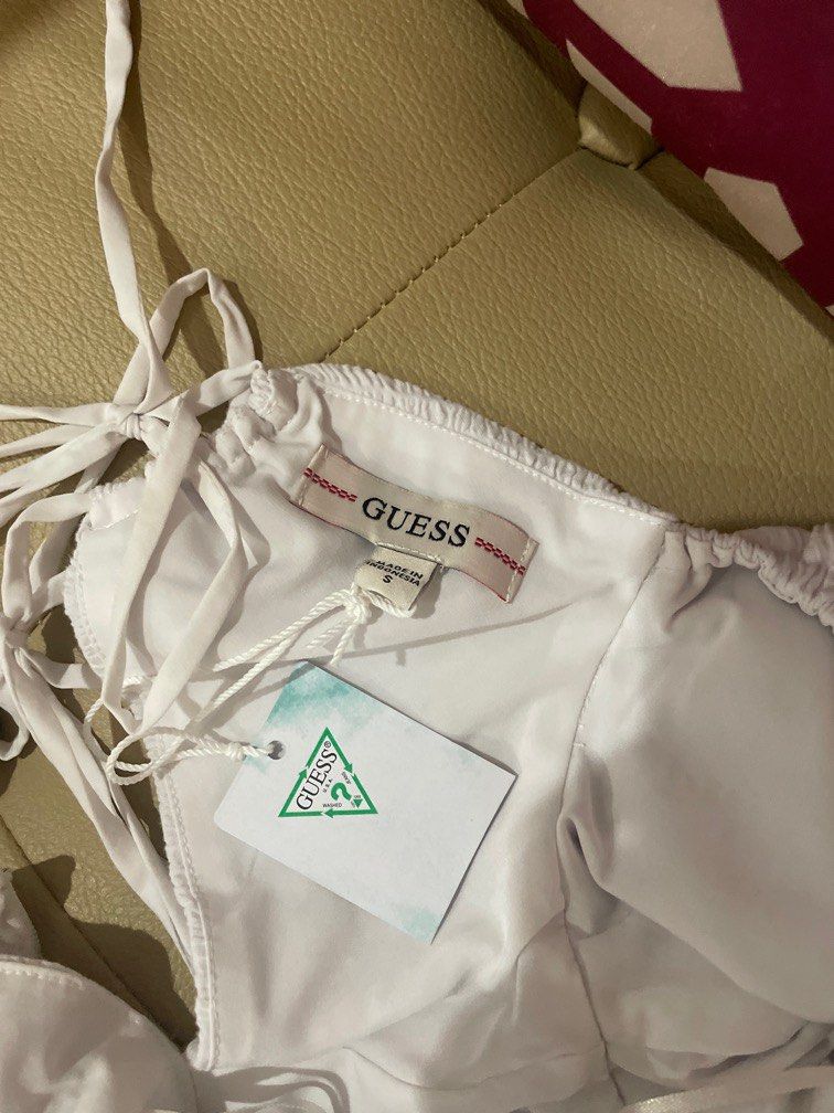 GUESS White ruffle sleeve mini dress (Category: Dresses) located in Quezon City. Submitted by starfleurs (Listing ID 1391645009, Image 3). Description: AUTHENTIC GUESS Bought from Outlet Size: S (runs large) -> M Never been used Fits 34-36" bust, 28-30" waist line MOP: GCash Shipping fee c/o buyer Location: Quezon City.