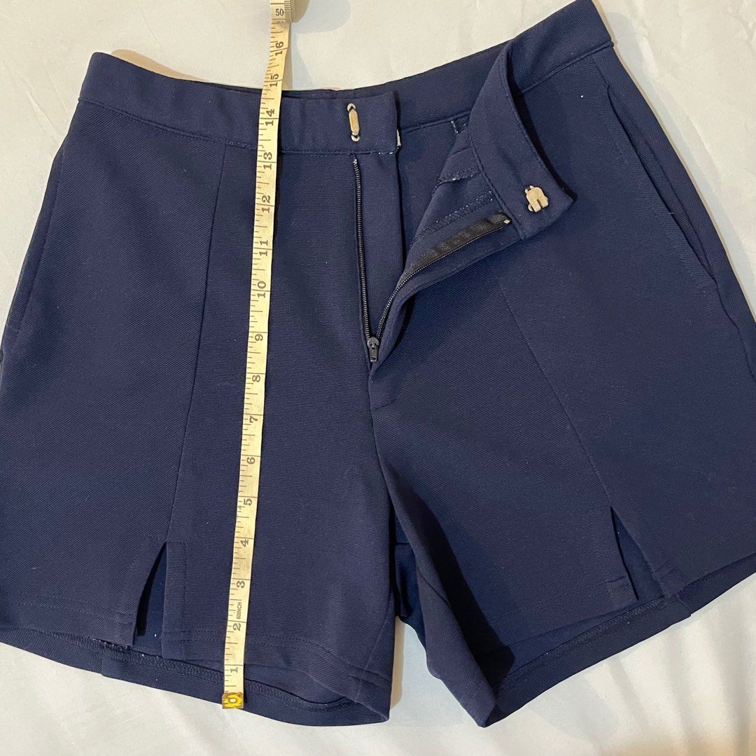 Highwaisted Navy Blue Preppy Shorts (Category: Shorts) located in Las Pinas. Submitted by sugardew (Listing ID 1391724616, Image 3). Description: fits s to m only ~ waist: 25-26in length: 15in - non-stretch fabric - has side pockets - bought from SM dept. store - has minimal stain bc of spilled adhesive glue(see last pic) rfs: decluttering loc: alabang mop: gcash, maya shipping: lalamove.