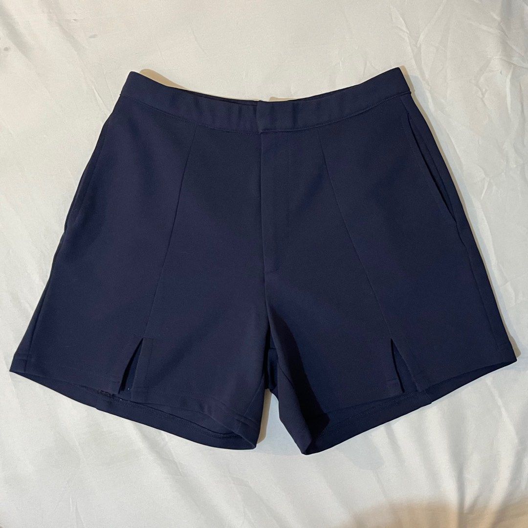 Highwaisted Navy Blue Preppy Shorts (Category: Shorts) located in Las Pinas. Submitted by sugardew (Listing ID 1391724616, Image 1). Description: fits s to m only ~ waist: 25-26in length: 15in - non-stretch fabric - has side pockets - bought from SM dept. store - has minimal stain bc of spilled adhesive glue(see last pic) rfs: decluttering loc: alabang mop: gcash, maya shipping: lalamove.